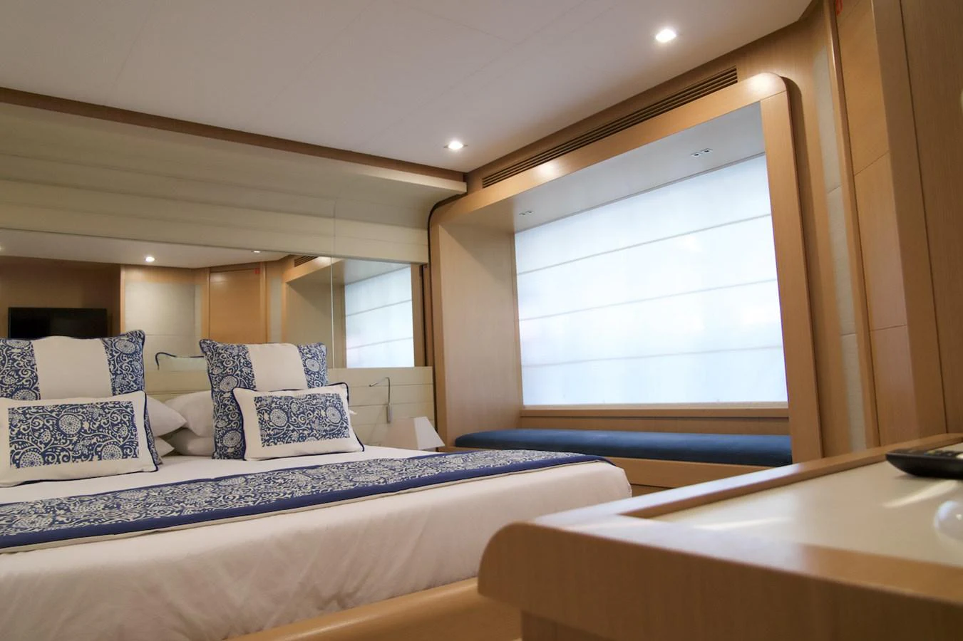 a room with a bed and a window aboard ANTONINA Yacht for Sale