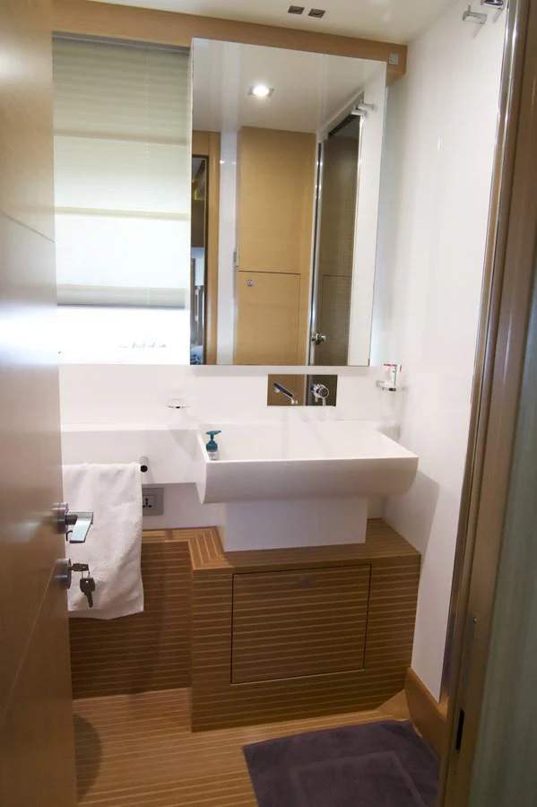 a bathroom with a sink and a mirror aboard ANTONINA Yacht for Sale