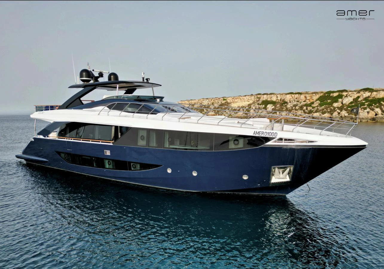 A sleek and modern yacht glides gracefully on calm waters, showcasing its elegant design. aboard ALTUS Yacht for Sale