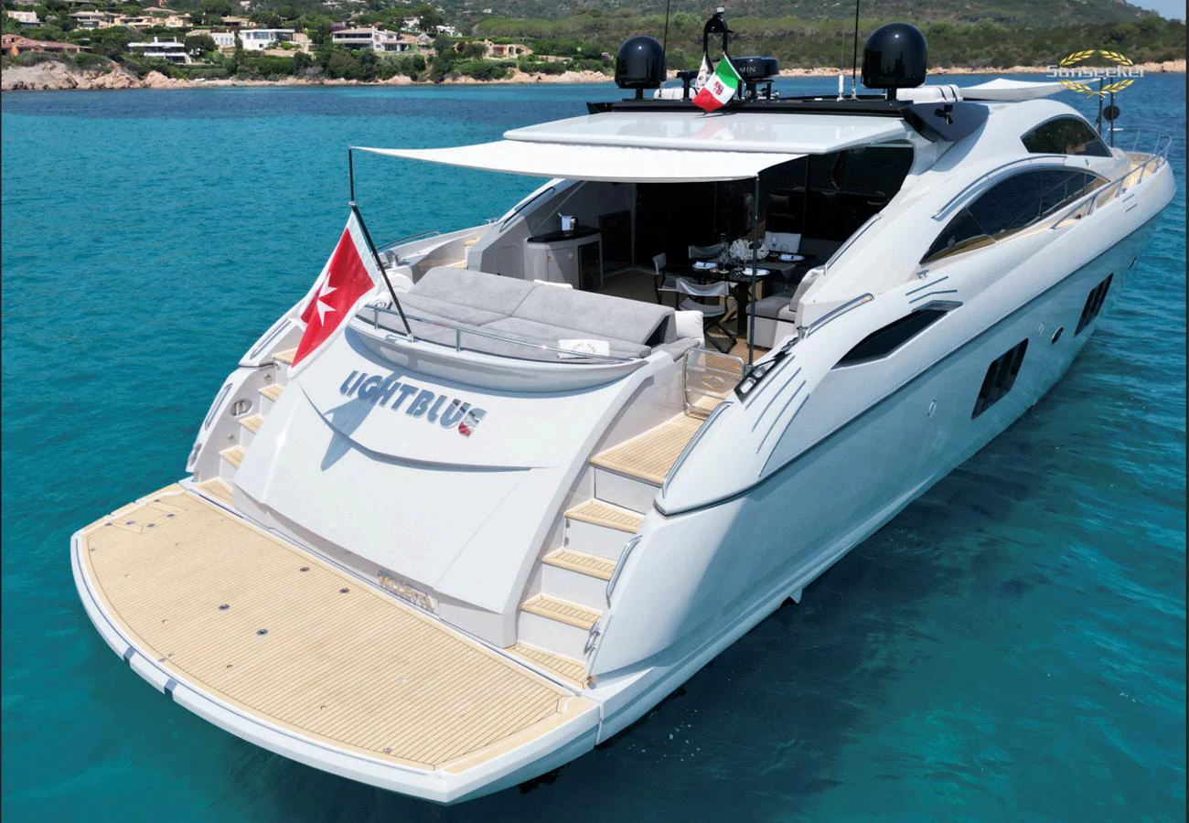 a white boat on the water aboard LIGHT BLUE Yacht for Sale