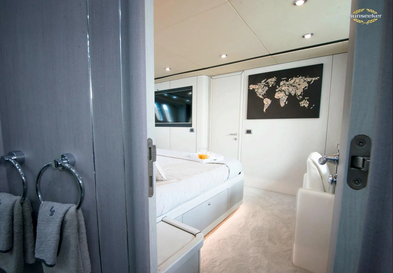 a bathroom with a tub sink and mirror aboard LIGHT BLUE Yacht for Sale