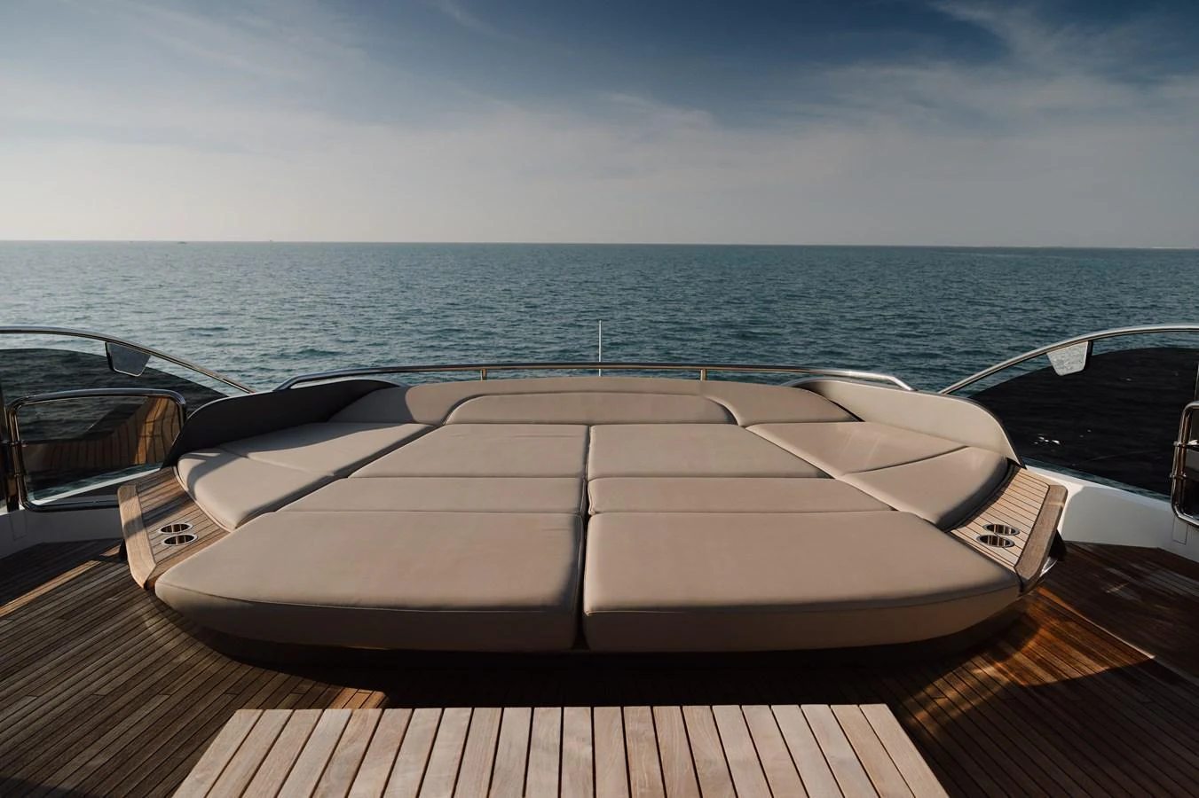 The yacht features a spacious sundeck with luxurious sun pads, perfect for relaxation and enjoying the sea view. aboard PRINCESS X95 808 Yacht for Sale