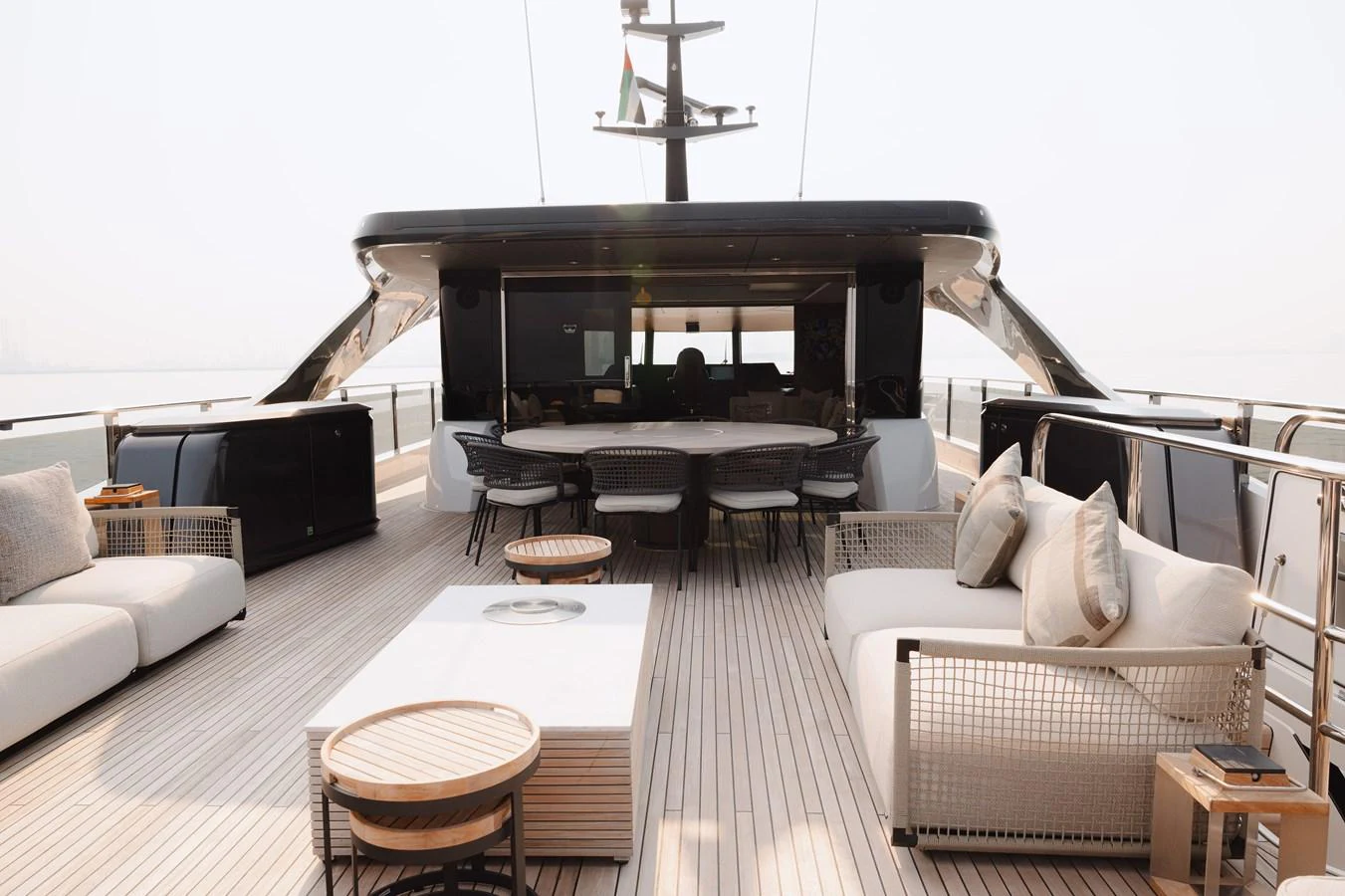 The spacious aft deck offers a luxurious outdoor lounging and dining area with elegant furnishings. aboard PRINCESS X95 808 Yacht for Sale