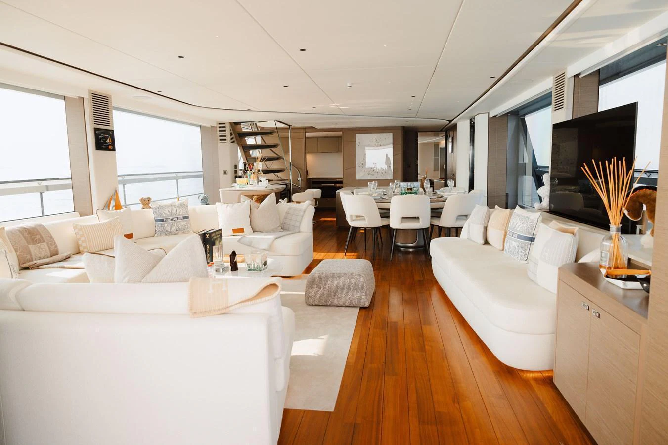 The spacious salon features elegant furnishings and ample natural light. aboard PRINCESS X95 808 Yacht for Sale