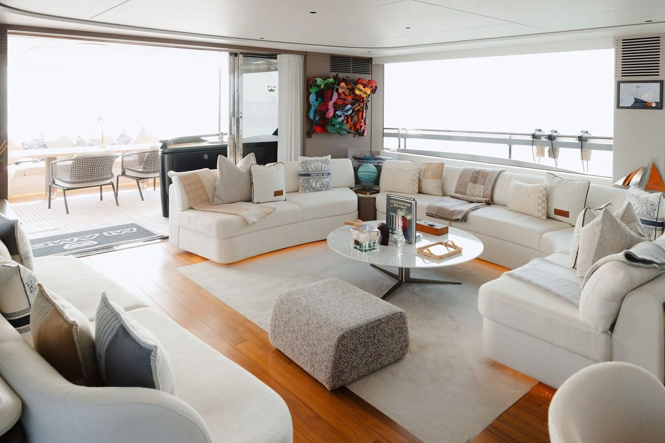 The yacht's salon features plush seating, modern decor, and ample natural light. aboard PRINCESS X95 808 Yacht for Sale