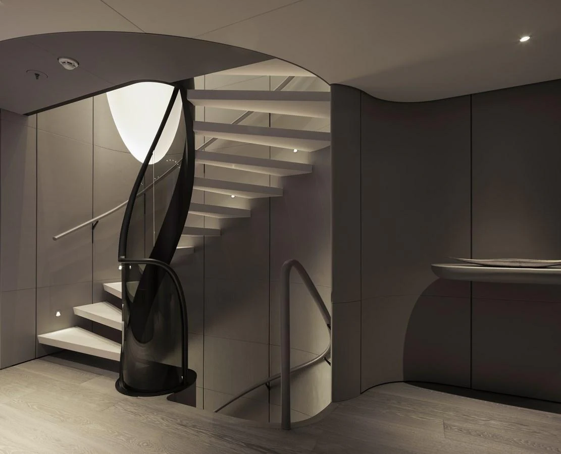 A sleek and modern interior staircase with a minimalist design. aboard ENTOURAGE Yacht for Sale