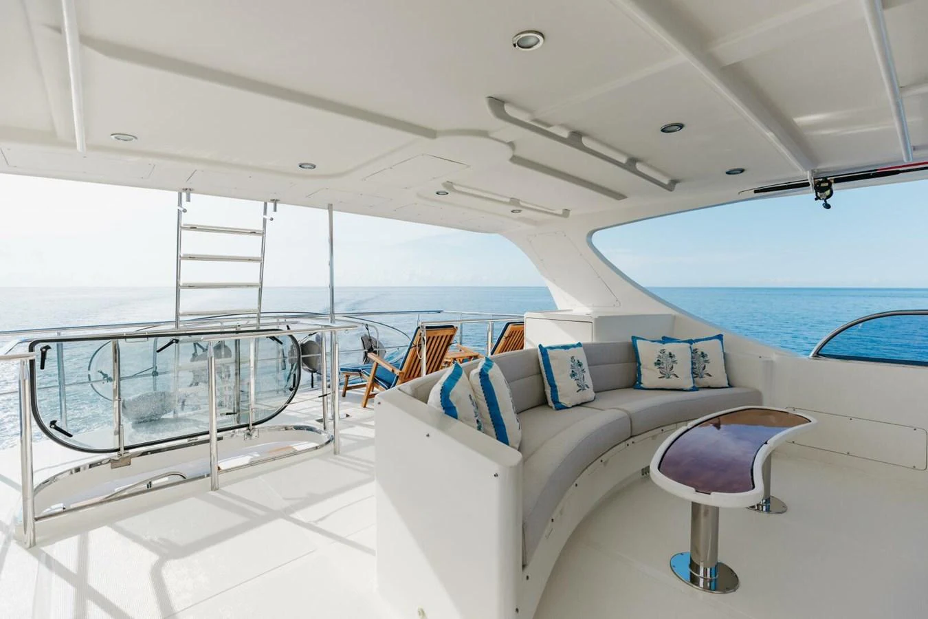 The flybridge offers a spacious seating area with a stunning ocean view. aboard AURELIA Yacht for Sale