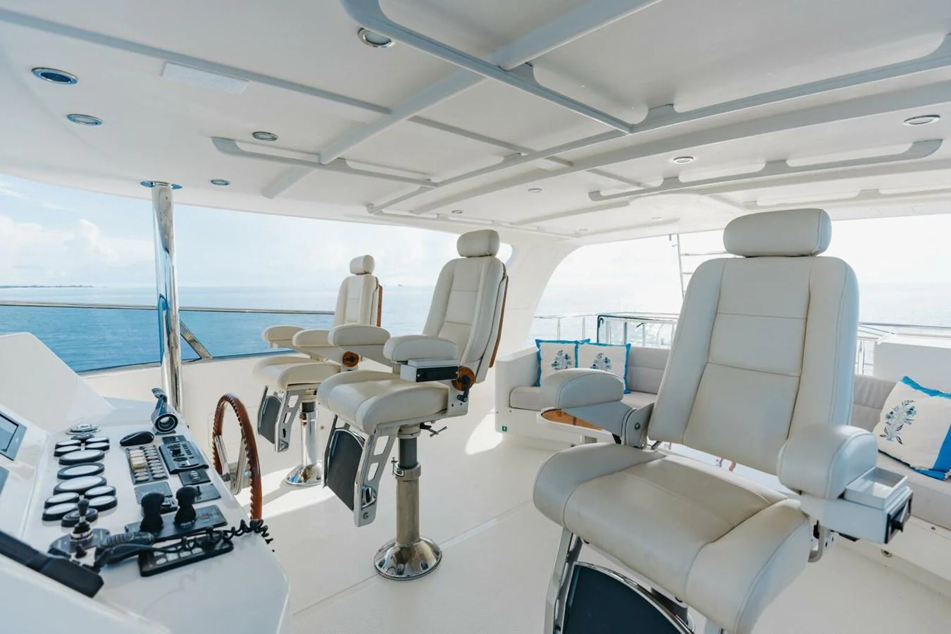 The helm station features luxurious seating and state-of-the-art navigation equipment. aboard AURELIA Yacht for Sale
