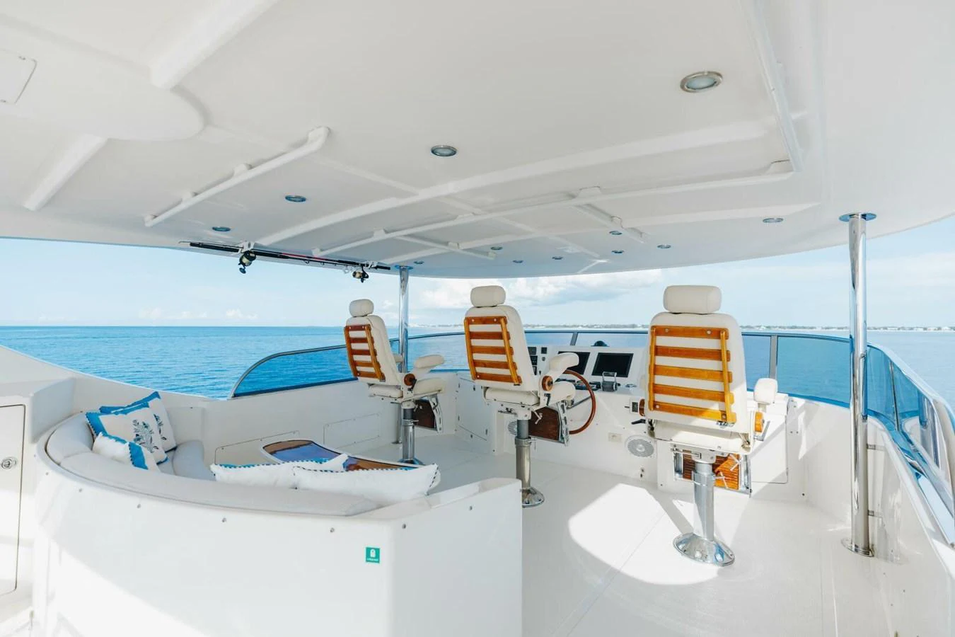 The flybridge offers a spacious and luxurious area with comfortable seating and a stunning view of the sea. aboard AURELIA Yacht for Sale