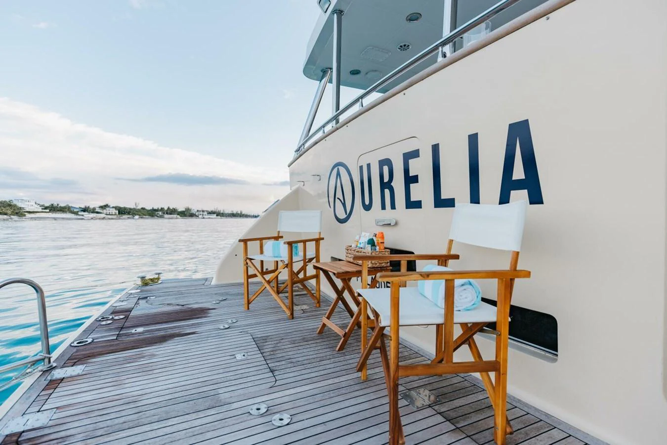 The aft deck features comfortable seating and a serene view of the water. aboard AURELIA Yacht for Sale