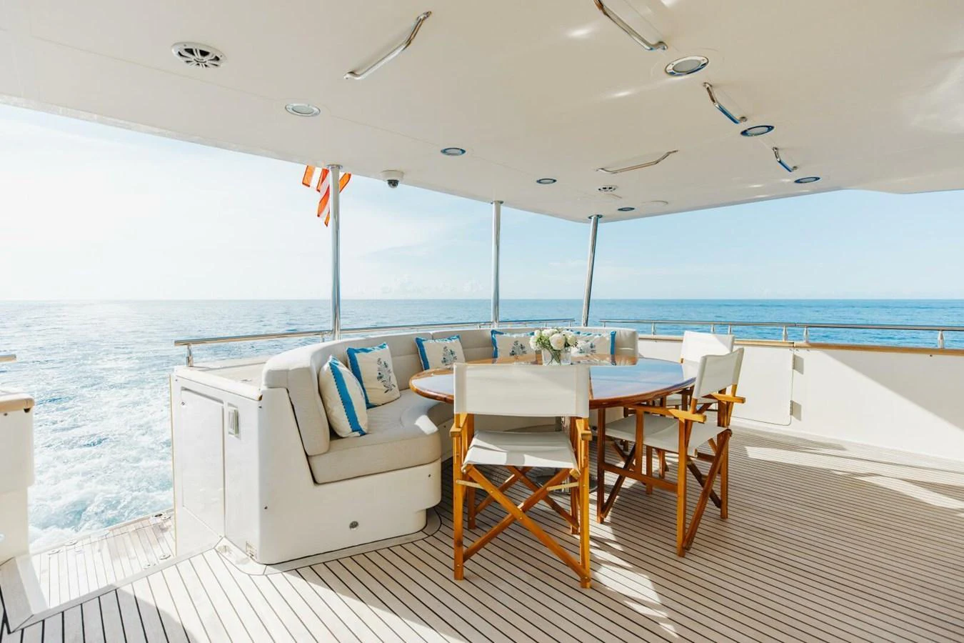 The aft deck offers a spacious and inviting area for alfresco dining with stunning ocean views. aboard AURELIA Yacht for Sale