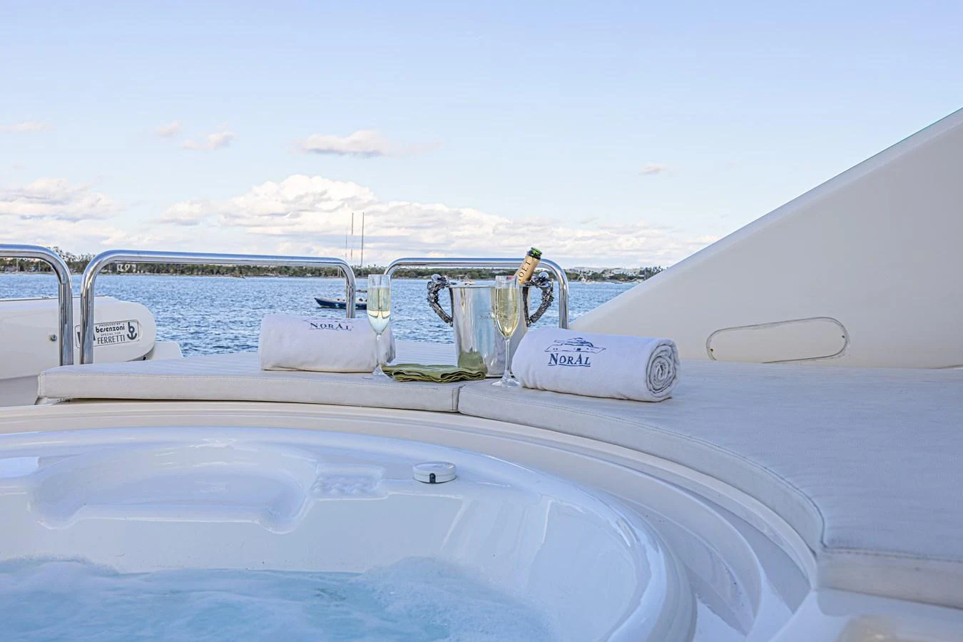 A luxurious jacuzzi on the yacht's deck offers a serene spot to relax with a view of the water. aboard NORAL Yacht for Sale