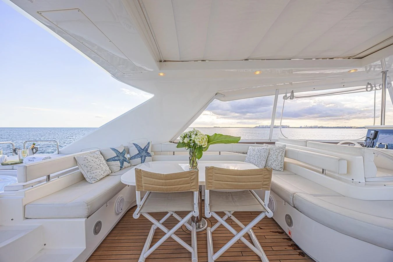 The aft deck offers a serene and inviting space with comfortable seating and a beautiful ocean view. aboard NORAL Yacht for Sale