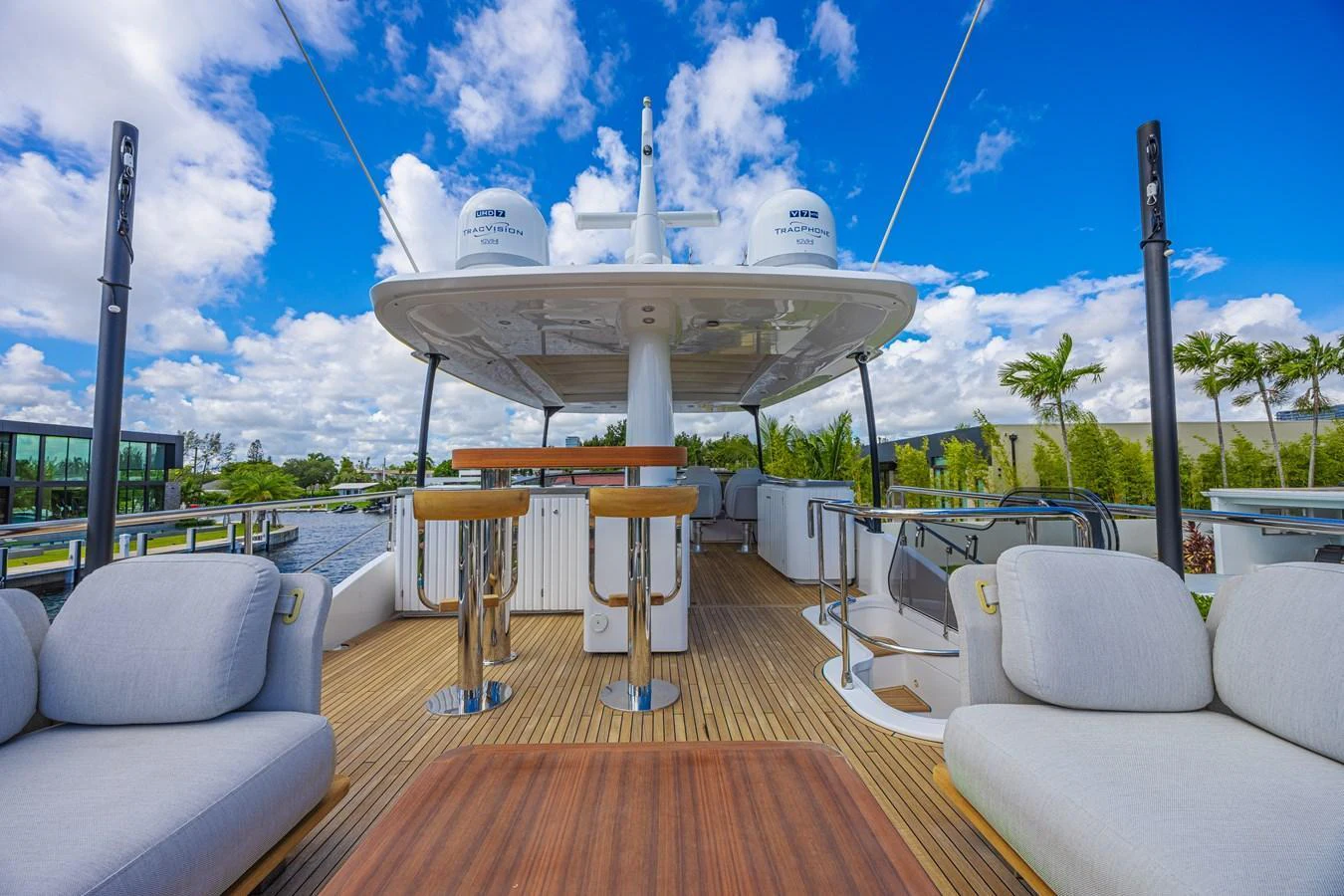 The flybridge offers a spacious and luxurious outdoor seating area with a stunning view. aboard XAX66M61L122 Yacht for Sale