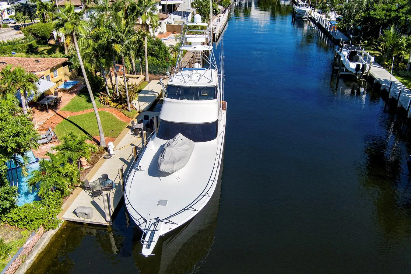 a boat is parked on the side of a river aboard VKY74038A808 Yacht for Sale