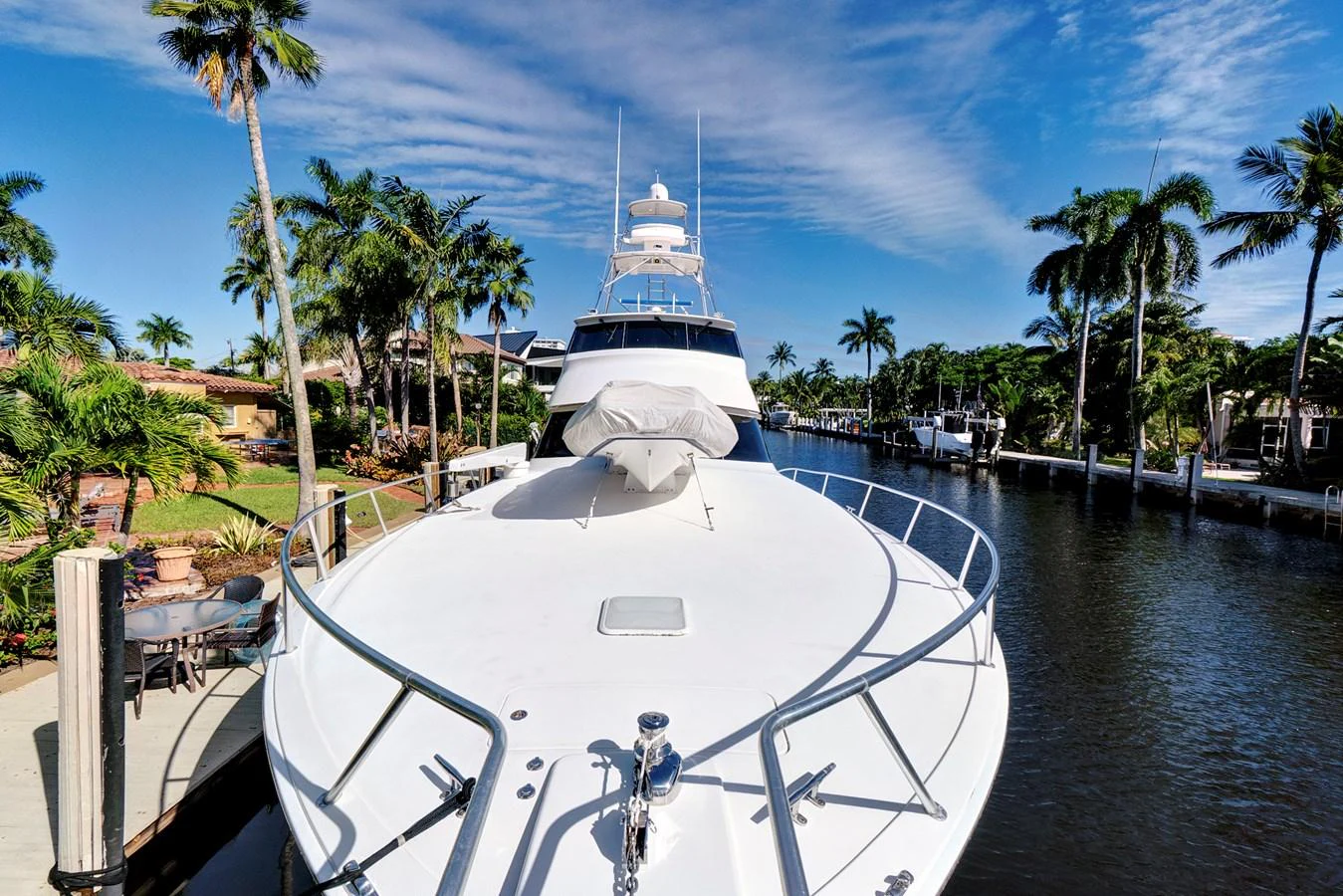 a white boat in a harbor aboard VKY74038A808 Yacht for Sale