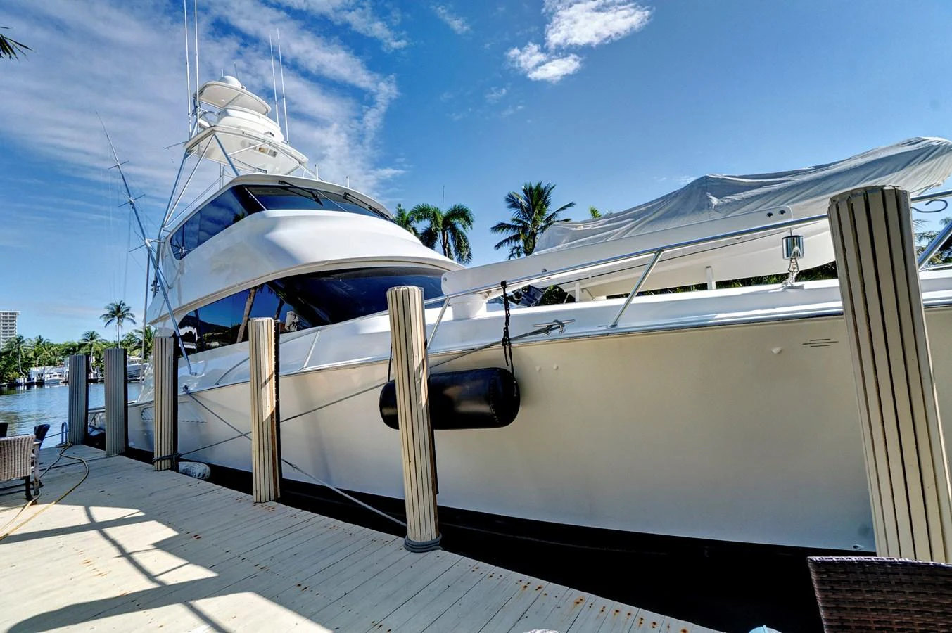 a white boat on a dock aboard VKY74038A808 Yacht for Sale