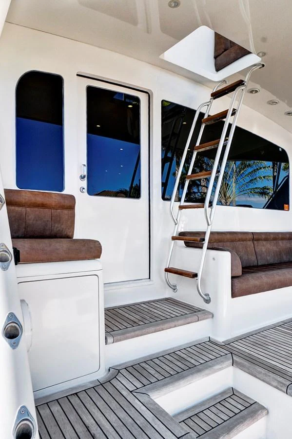 a white vehicle with a staircase aboard VKY74038A808 Yacht for Sale