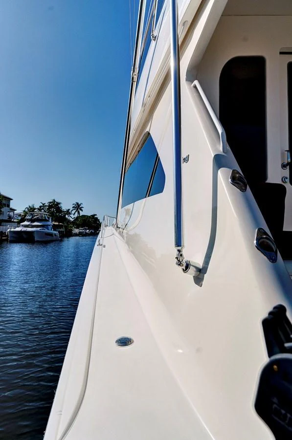 a white boat on the water aboard VKY74038A808 Yacht for Sale
