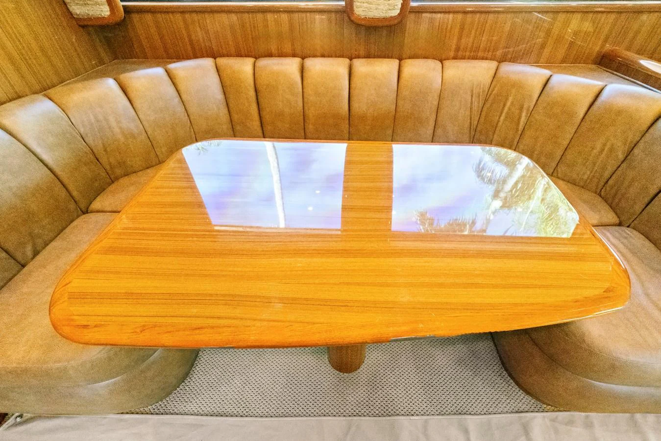 a wooden coffee table aboard VKY74038A808 Yacht for Sale