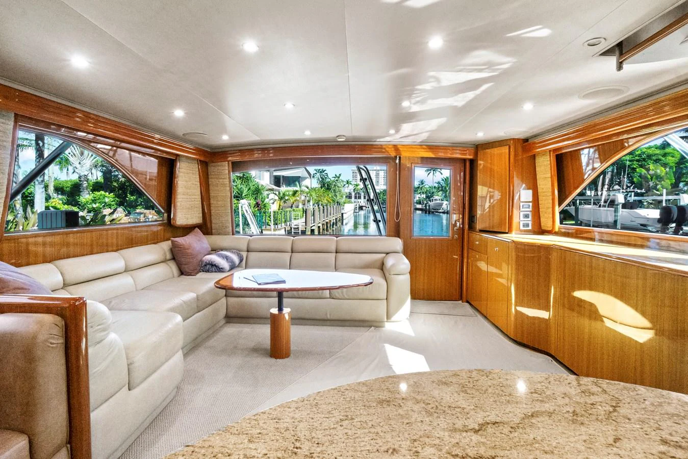 a living room with a couch and a table aboard VKY74038A808 Yacht for Sale