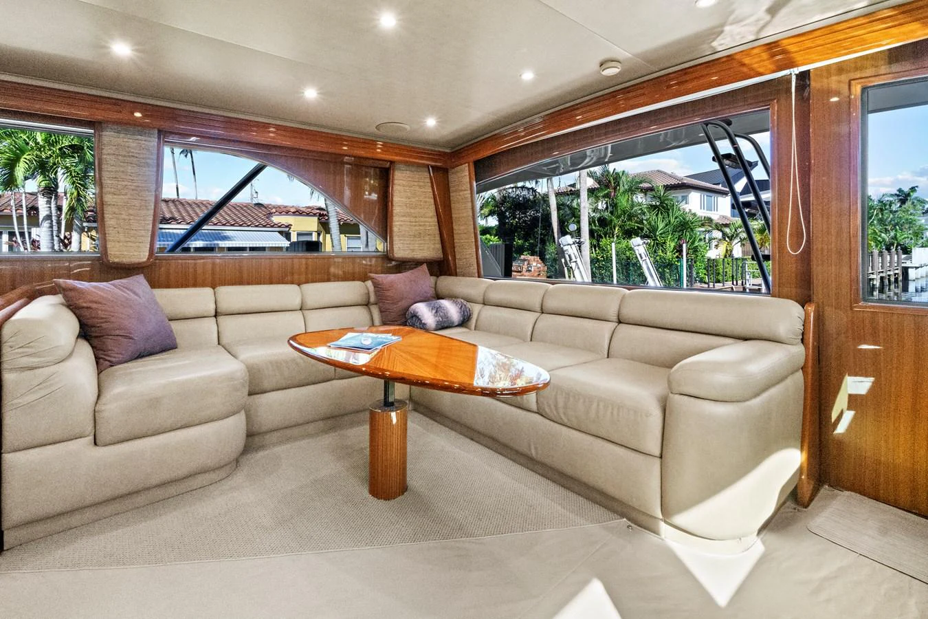 a living room with a couch and a table aboard VKY74038A808 Yacht for Sale