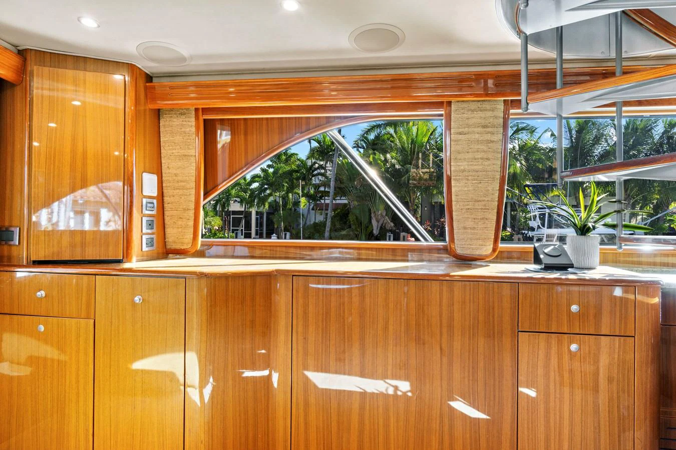 a kitchen with wooden cabinets aboard VKY74038A808 Yacht for Sale