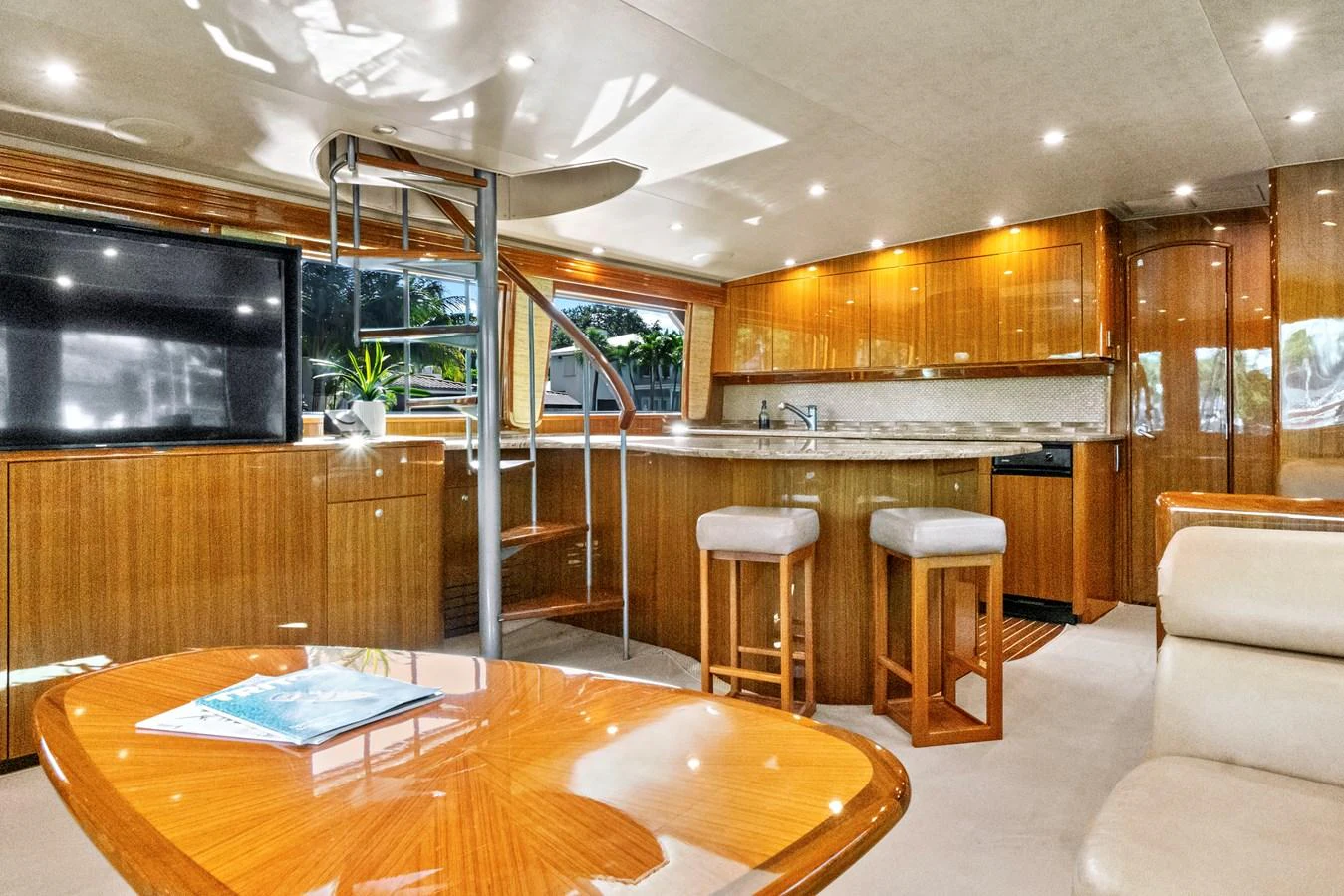 a kitchen with wooden cabinets aboard VKY74038A808 Yacht for Sale