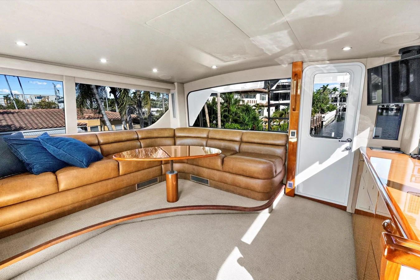 a living room with a couch and a table aboard VKY74038A808 Yacht for Sale