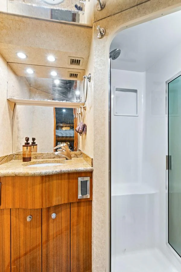 a bathroom with a sink and a mirror aboard VKY74038A808 Yacht for Sale