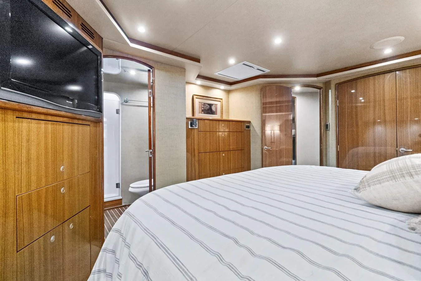 a bedroom with a bed and a television aboard VKY74038A808 Yacht for Sale