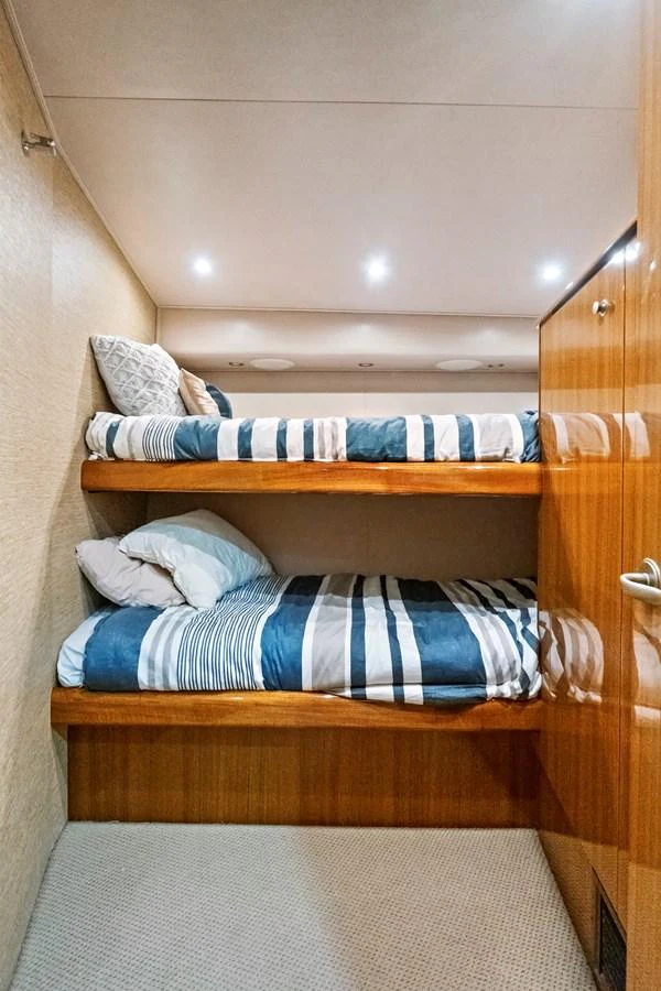 a group of clothes on a shelf aboard VKY74038A808 Yacht for Sale
