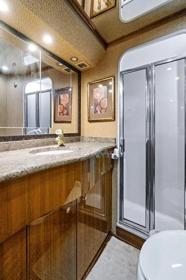a bathroom with a marble counter top aboard VKY74038A808 Yacht for Sale