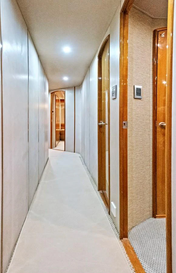 a hallway with doors aboard VKY74038A808 Yacht for Sale