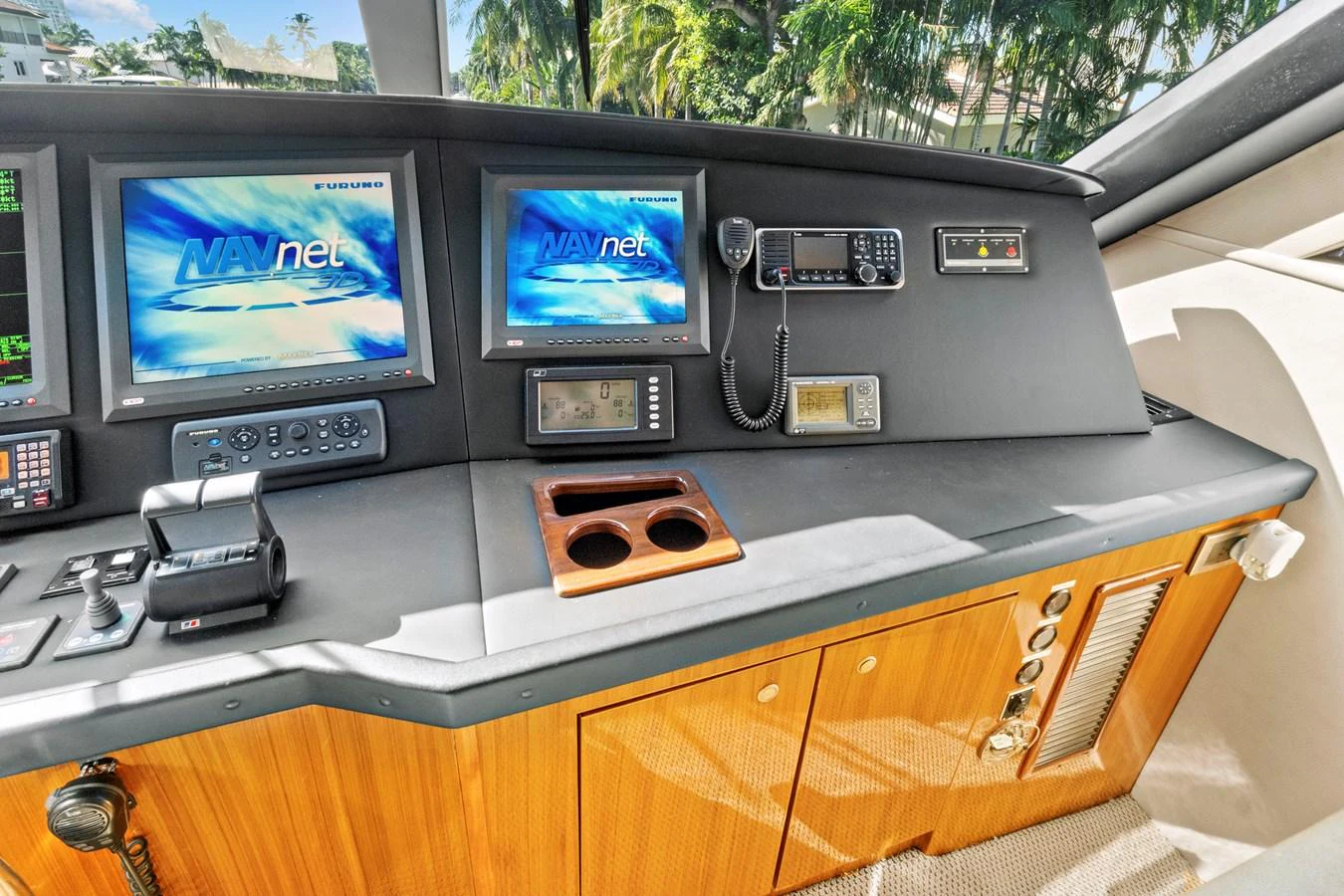 a video game console and a video game console on a table aboard VKY74038A808 Yacht for Sale