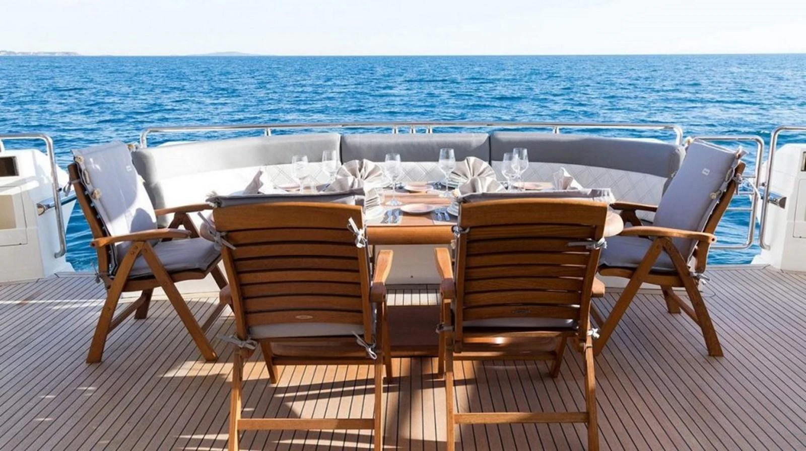 a table set up on a deck aboard ALBATOR 2 Yacht for Sale