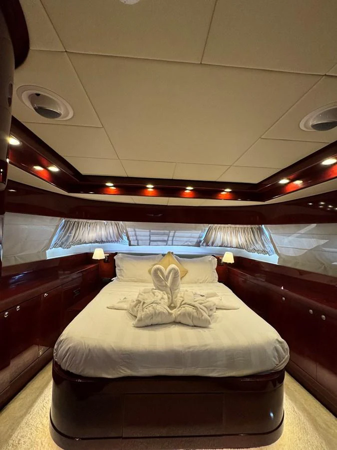 a bed in a room aboard ALBATOR 2 Yacht for Sale