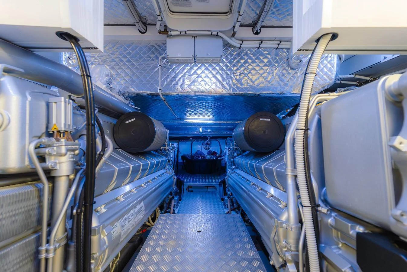 The image showcases the meticulously maintained engine room of the yacht, highlighting its advanced machinery and systems. aboard NOVA Yacht for Sale