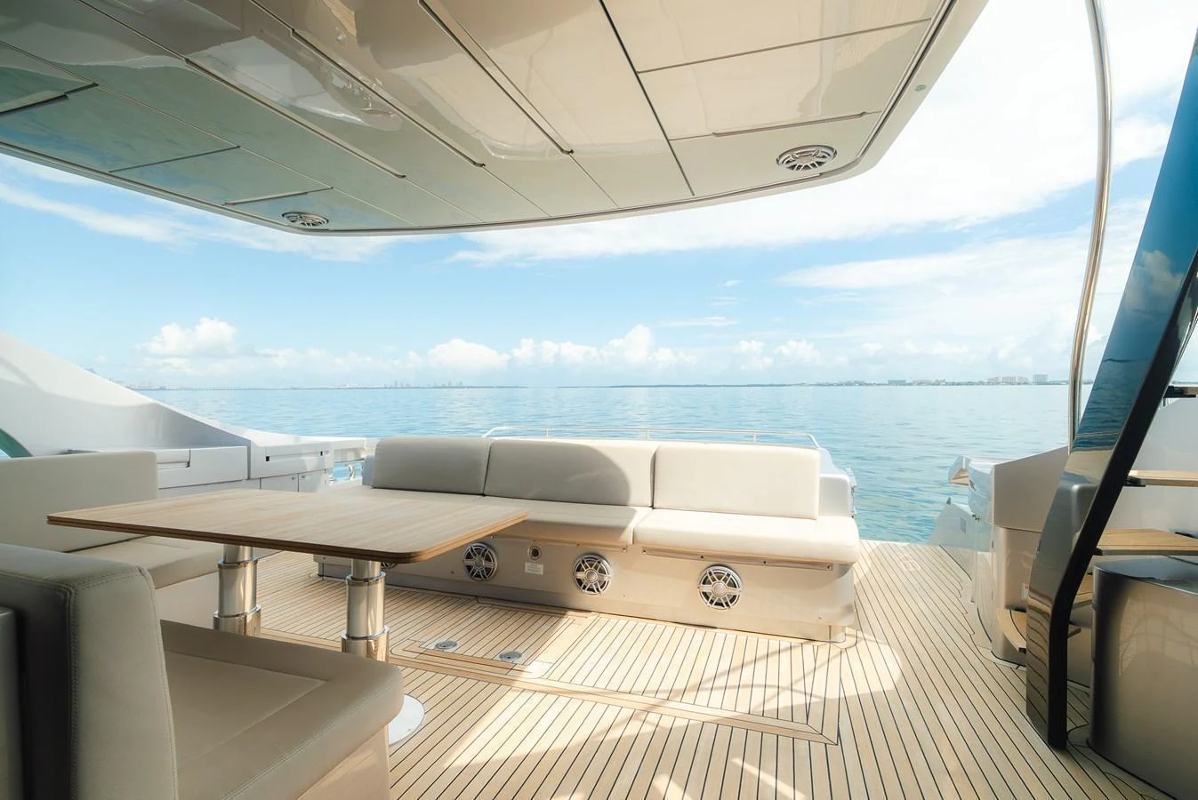 The aft deck offers a serene and spacious area for relaxation with stunning ocean views. aboard NOVA Yacht for Sale
