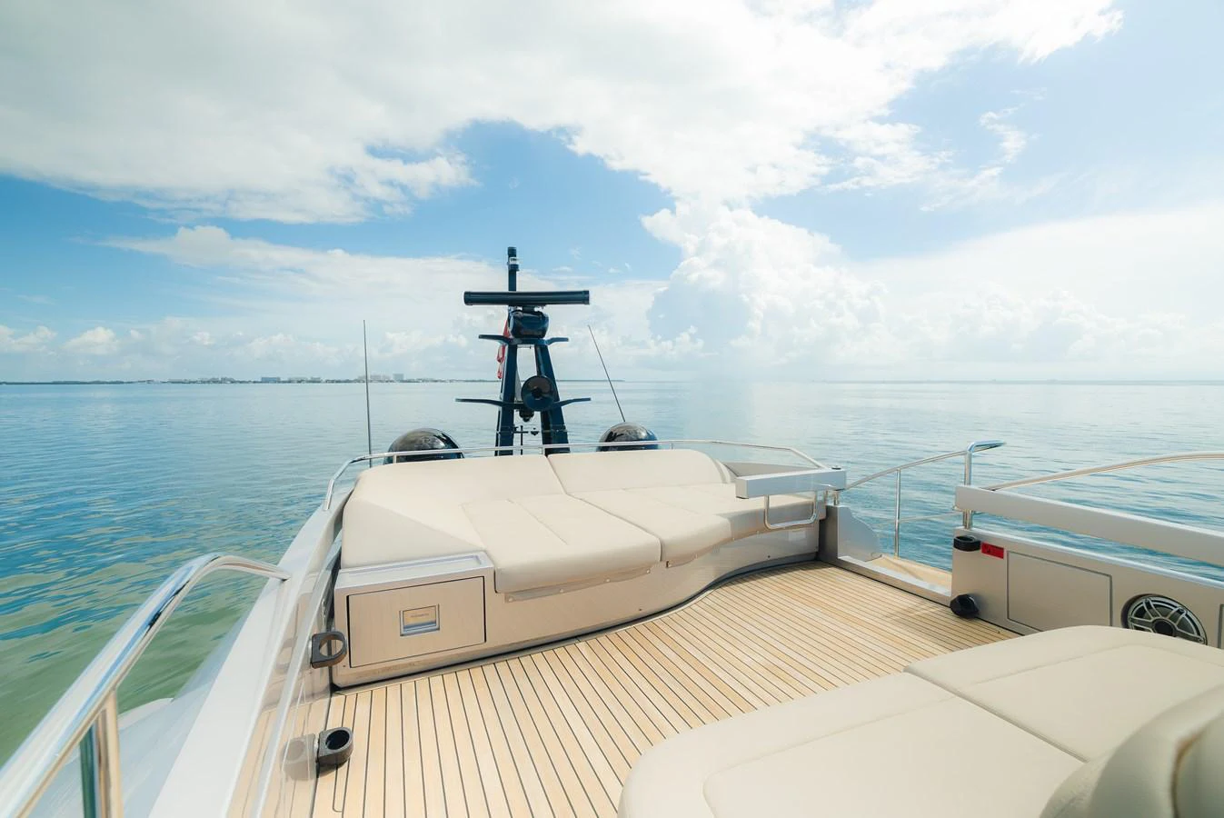 The flybridge offers a spacious lounging area with stunning ocean views. aboard NOVA Yacht for Sale