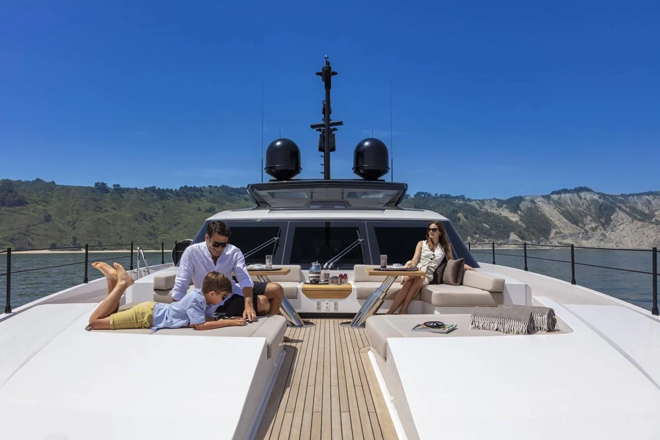 The foredeck of the yacht features spacious lounging areas with comfortable seating and stunning views. aboard CUSTOM LINE SAETTA 128/02 Yacht for Sale