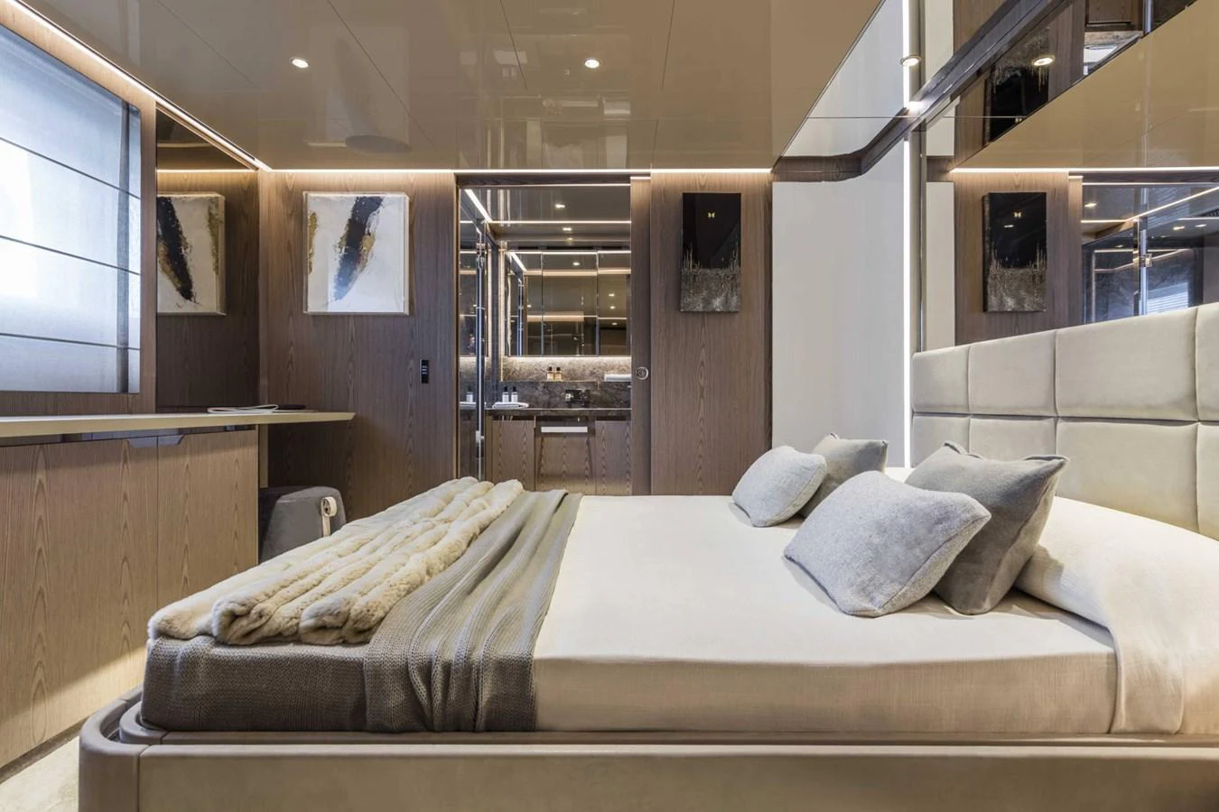 The stateroom features a luxurious bed with plush bedding and elegant decor. aboard CUSTOM LINE SAETTA 128/02 Yacht for Sale