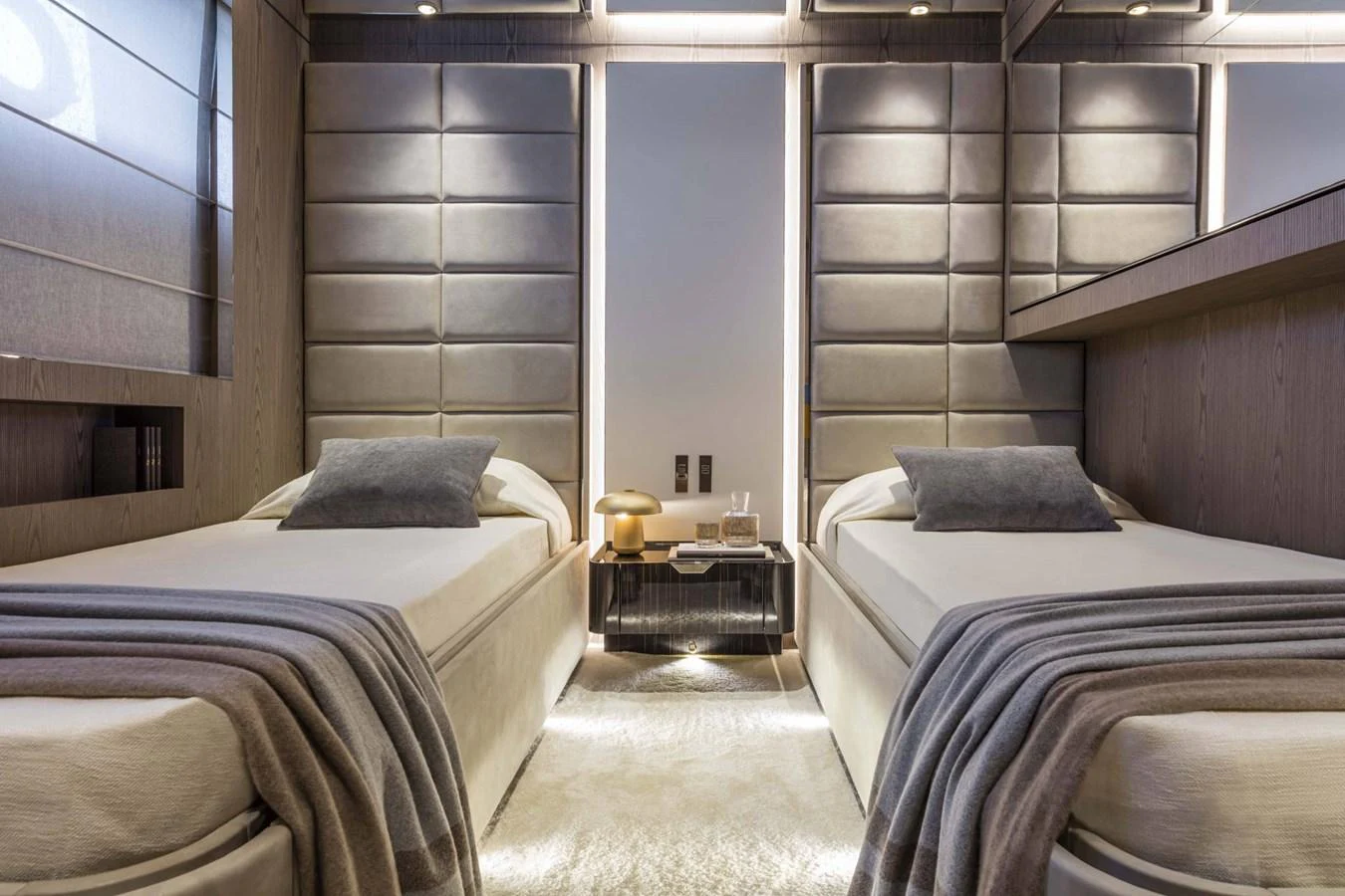 A luxurious twin stateroom featuring modern design and cozy bedding. aboard CUSTOM LINE SAETTA 128/02 Yacht for Sale