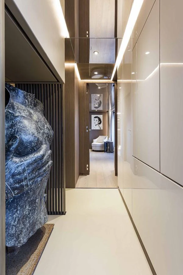 A stylish hallway featuring modern art and sleek design elements. aboard CUSTOM LINE SAETTA 128/02 Yacht for Sale