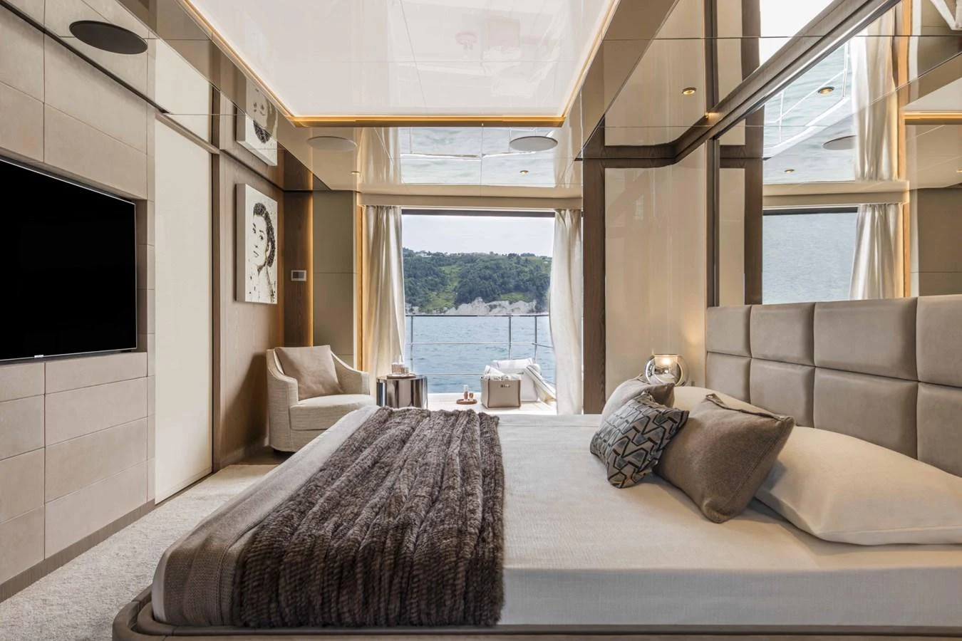 The master stateroom offers luxurious comfort with a stunning view of the sea. aboard CUSTOM LINE SAETTA 128/02 Yacht for Sale
