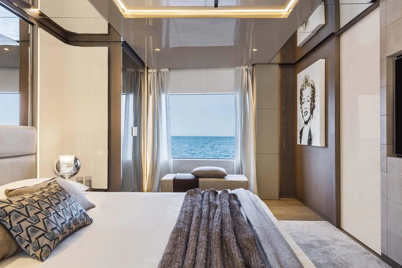 The master stateroom offers a luxurious and serene retreat with a stunning ocean view. aboard CUSTOM LINE SAETTA 128/02 Yacht for Sale
