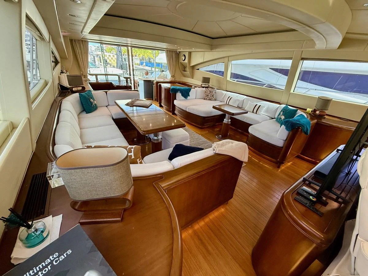 a room with a large window aboard OLIVIA K Yacht for Sale