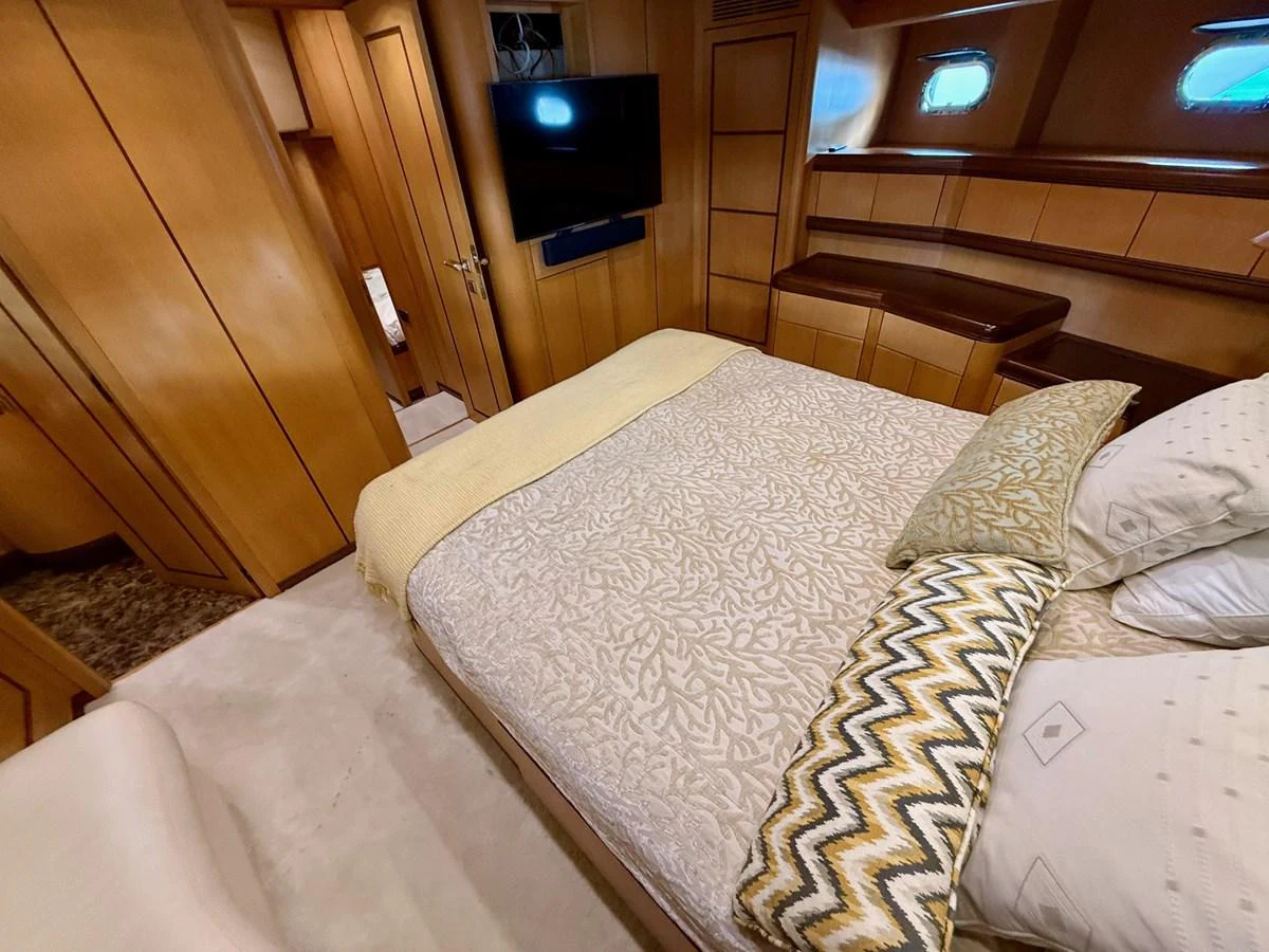 a couple of beds in a cabin aboard OLIVIA K Yacht for Sale