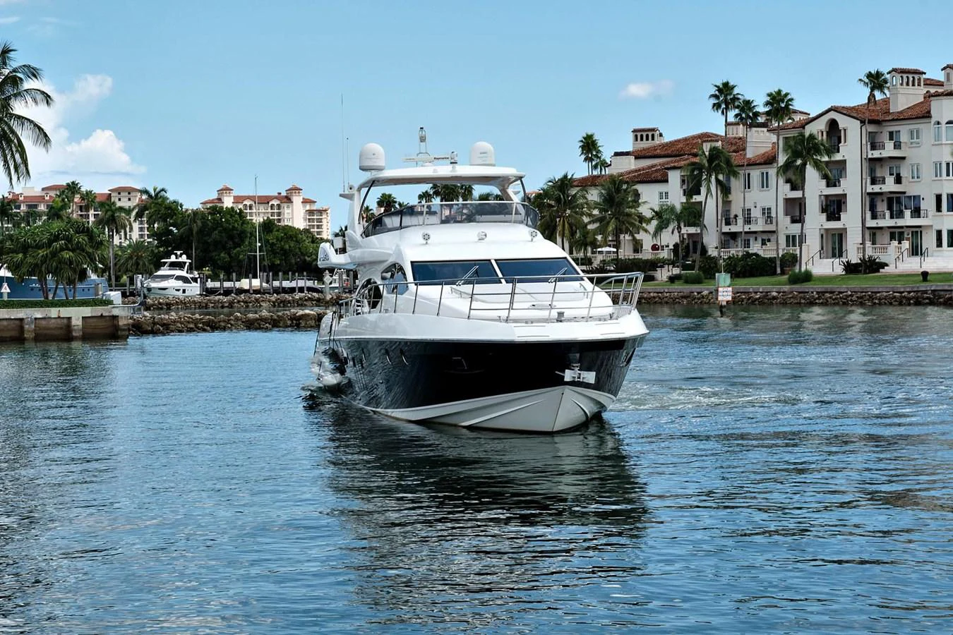 a white boat in the water aboard DREN Yacht for Sale