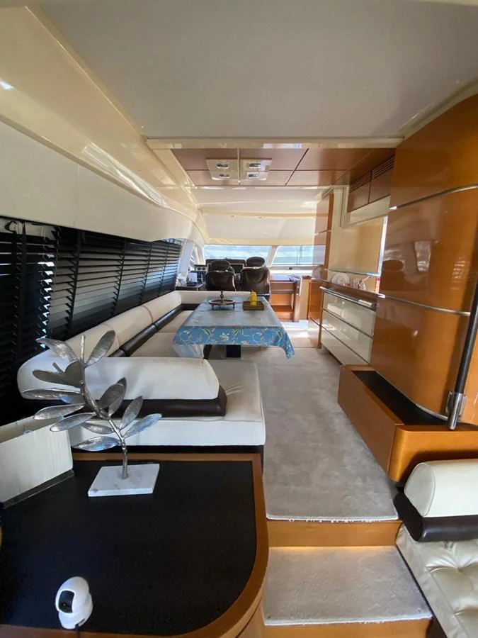 a room with a desk and a bed aboard DREN Yacht for Sale